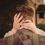 Romantic embrace with couple's reflection overlay.