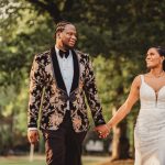 Bride and groom holding hands outdoors