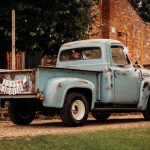 Vintage truck with 'Just Married' sign.