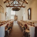 Elegant wedding reception with decorated dining tables