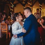 Couple dancing at a wedding reception.