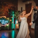 Bride and groom dancing at wedding reception