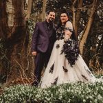 Bride and groom in woodland wedding scene