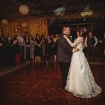 Bride and groom's first dance at wedding reception.