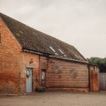 Traditional British brick house with wooden extension