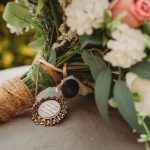 Bridal bouquet with a decorative photo locket.