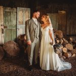 Bride and groom in rustic woodsy setting