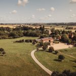 Aerial view of countryside farm buildings