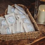 Basket of personalised wedding seed packets.