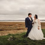 Wedding couple outdoors near marshland