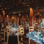 Banquet hall with elegant table settings.