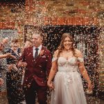 Bride and groom with confetti celebration