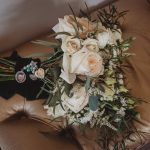 Elegant rose bouquet on a beige chair