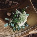 Floral bouquet on a vintage chair.