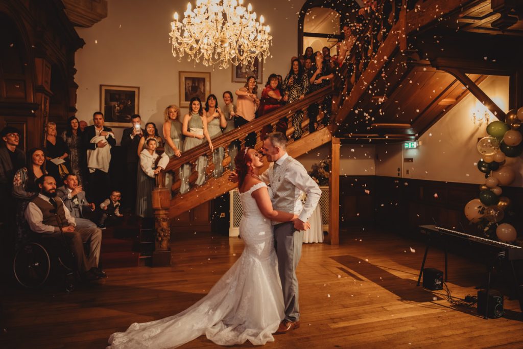 Bride and groom's first dance at wedding celebration at Holmewood Hall