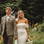 Bride and groom in garden setting