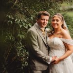 Bride and groom in garden portrait