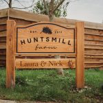 Huntsmill Farm sign with Laura & Nick names.