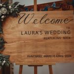 Laura's wedding sign with floral decoration