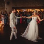 Bride and groom dancing at their wedding reception.