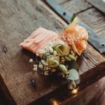 Rustic wooden table with small floral arrangement