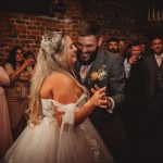 Bride and groom dancing at their wedding reception.