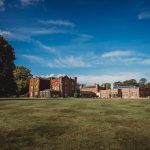 Historic mansion with blue sky background