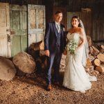 Bride and groom in rustic setting